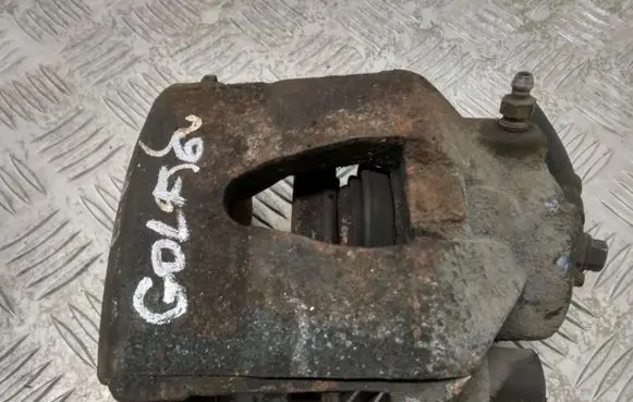Volkswagen Golf VI Front brake caliper