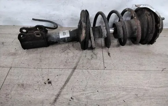 Toyota Avensis T220 Front shock absorber with coil spring