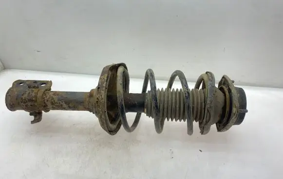 Front shock absorber with coil spring