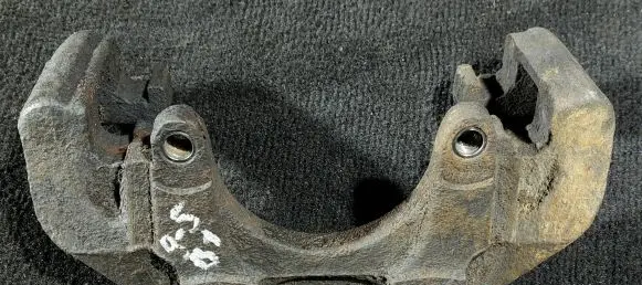 Saab 9-5 Front Brake Caliper Pad/Carrier 