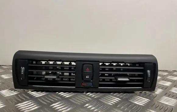 Dash center air vent grill