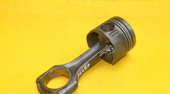 Piston with connecting rod