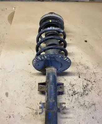 Front shock absorber with coil spring