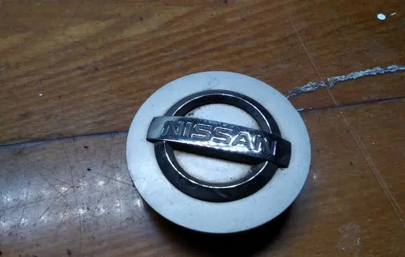 Nissan Primera Original wheel cap 403428H700