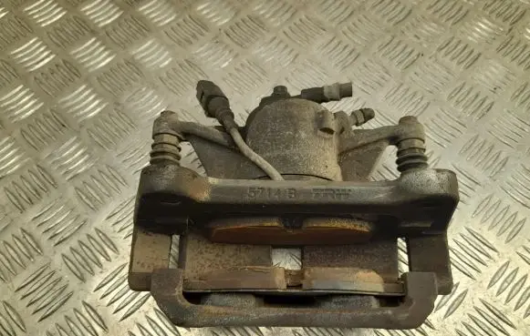 Volkswagen Tiguan Front brake caliper 6799G