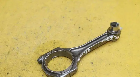 Piston with connecting rod