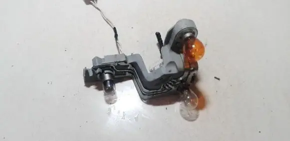 Mitsubishi Outlander Tail light bulb cover holder