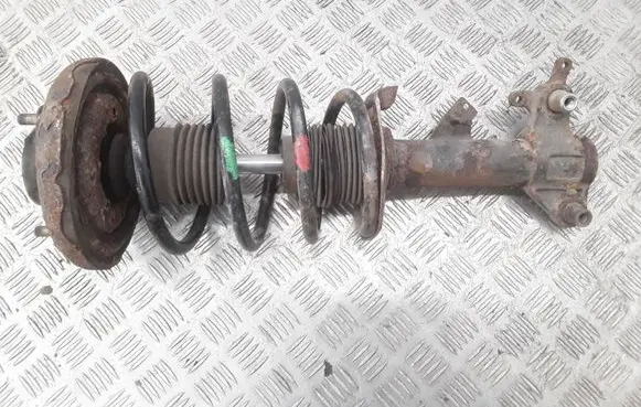 Nissan Primera Front shock absorber with coil spring