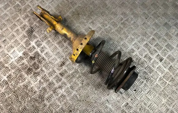 Subaru Legacy Front shock absorber with coil spring