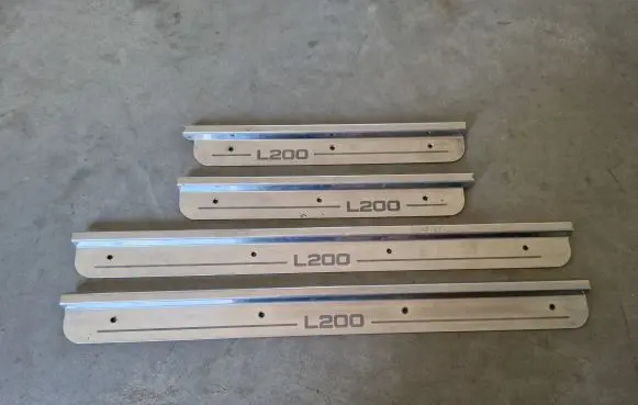 Mitsubishi L200 sill trim set (inner) 
