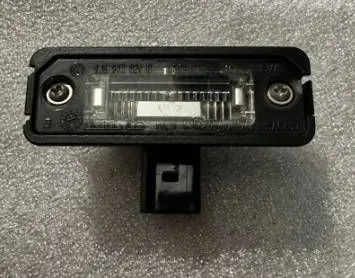 Porsche Cayman 987 Number plate light 99763162000 00029169466