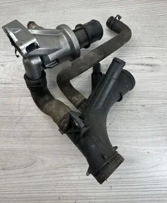 Thermostat/thermostat housing