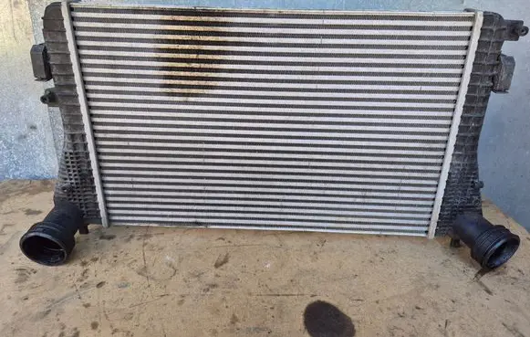 Volkswagen Touran I Intercooler radiator PA66GF35 7042L04