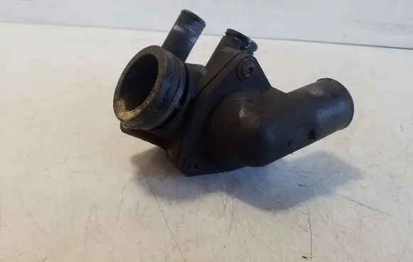 Thermostat/thermostat housing