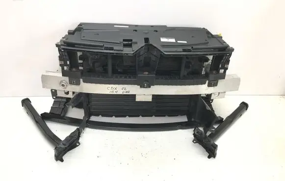 Radiator support slam panel
