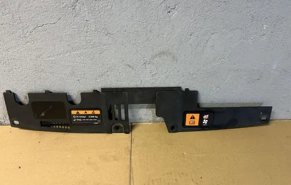 Engine bonnet/hood lock trim molding