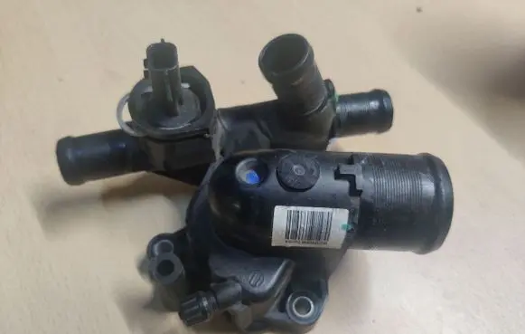 Thermostat/thermostat housing