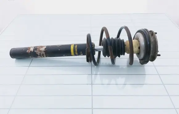 Front shock absorber with coil spring