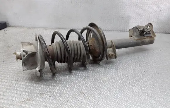 Front shock absorber with coil spring
