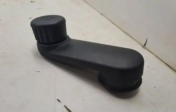 Dacia Sandero III Rear door window winding handle 807604387R