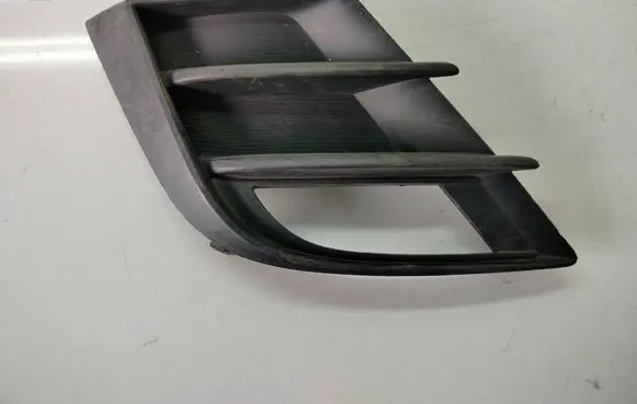 Mazda 3 II Front bumper lower grill BBN250C11C