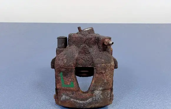 Skoda Fabia Mk2 (5J) Front brake caliper