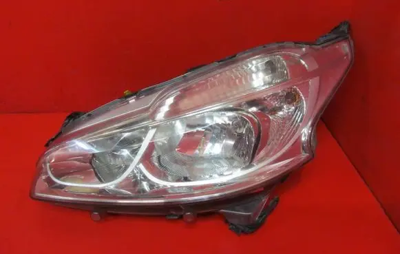 Peugeot 208 I Headlight/headlamp 9802221880