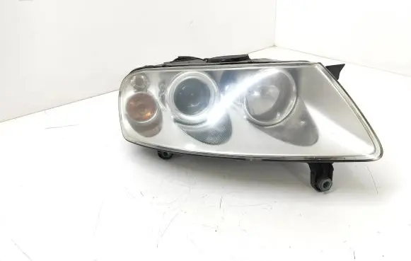 Volkswagen Touareg I Headlight/headlamp 7L6941016BJ 89307881