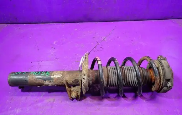 Volkswagen Touran I Front shock absorber with coil spring 