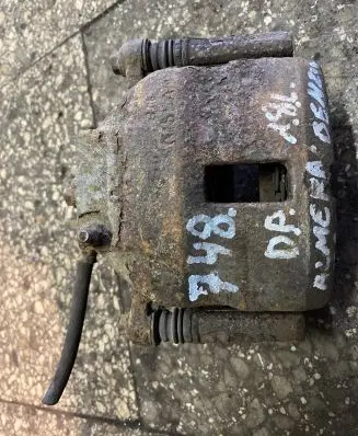 Nissan Almera N16 Front brake caliper