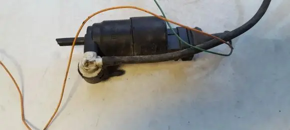 Renault Laguna I Windscreen/windshield washer pump 7700821782