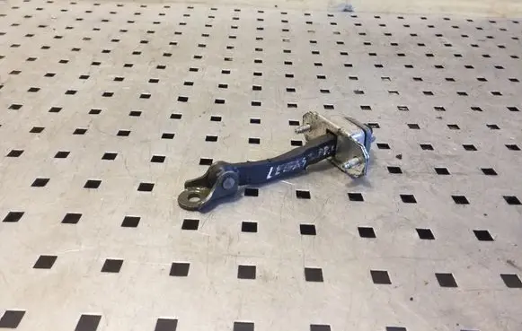 Subaru Legacy Front door check strap stopper