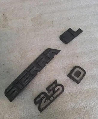 Ford Sierra Manufacturers badge/model letters 