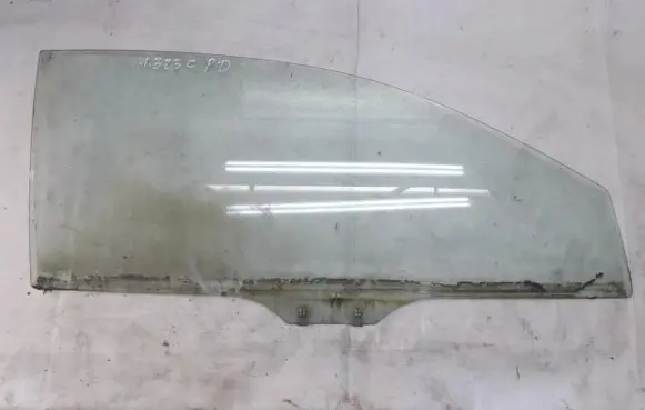 Mazda 323 Front door window glass four-door