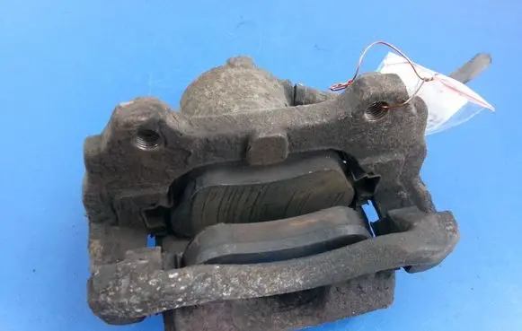 Opel Corsa D Front brake caliper