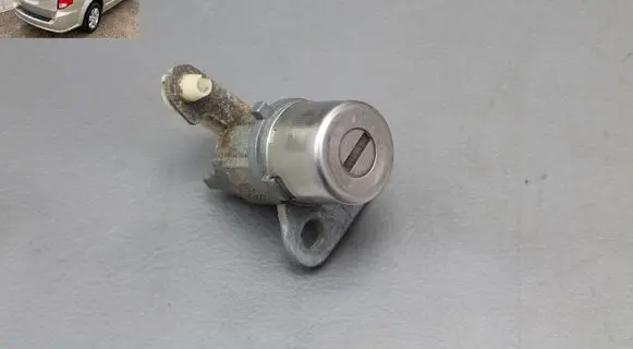 Dodge Grand Caravan Front door lock (next to the handle) 