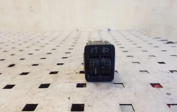Headlight level height control switch