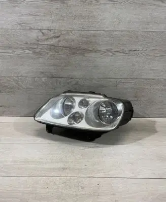 Volkswagen Touran I Headlight/headlamp 0301205601