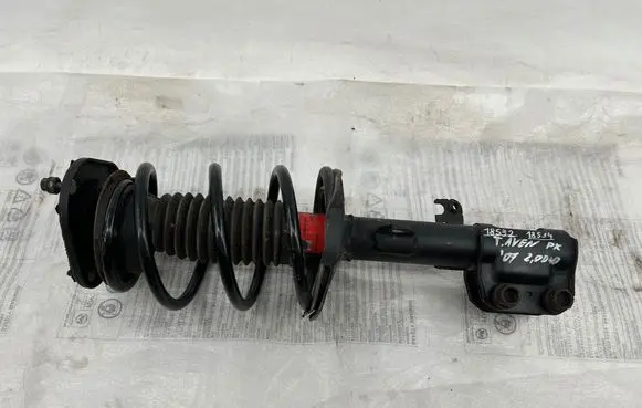 Toyota Avensis T250 Front shock absorber with coil spring 757229L L18524 TRW