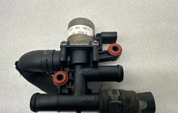 Coolant heater control valve