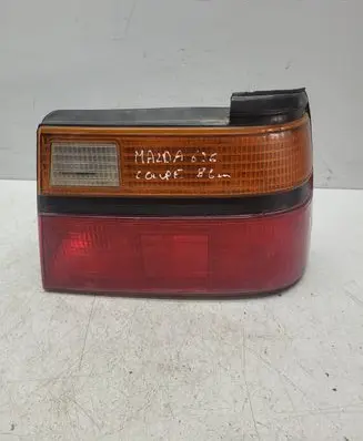 Mazda 626 Tail light bulb cover holder 0436886R