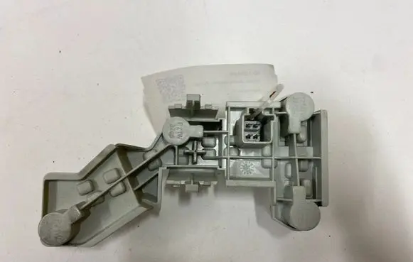 Volvo V50 Tail light bulb cover holder