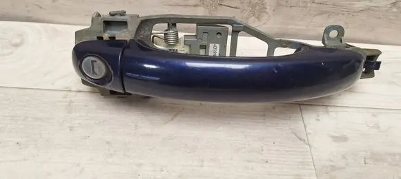 Volkswagen Touareg I Front door exterior handle 7L0837885D