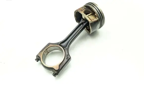 Piston with connecting rod