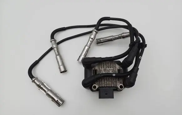 Volkswagen Touran I High voltage ignition coil 032905106B