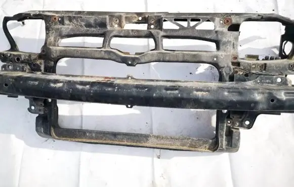 Radiator support slam panel