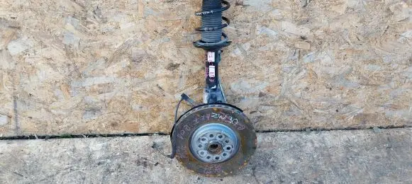 Front wheel hub spindle knuckle