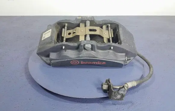 Ford Mustang I Front brake caliper JR3C-2010-JB