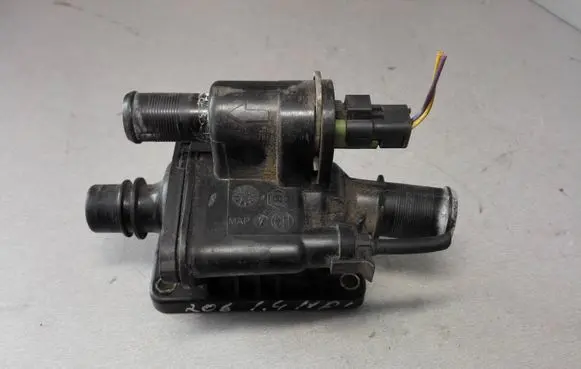 Thermostat/thermostat housing