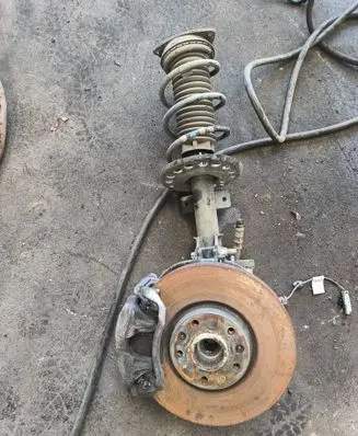 Opel Astra L Front shock absorber with coil spring 